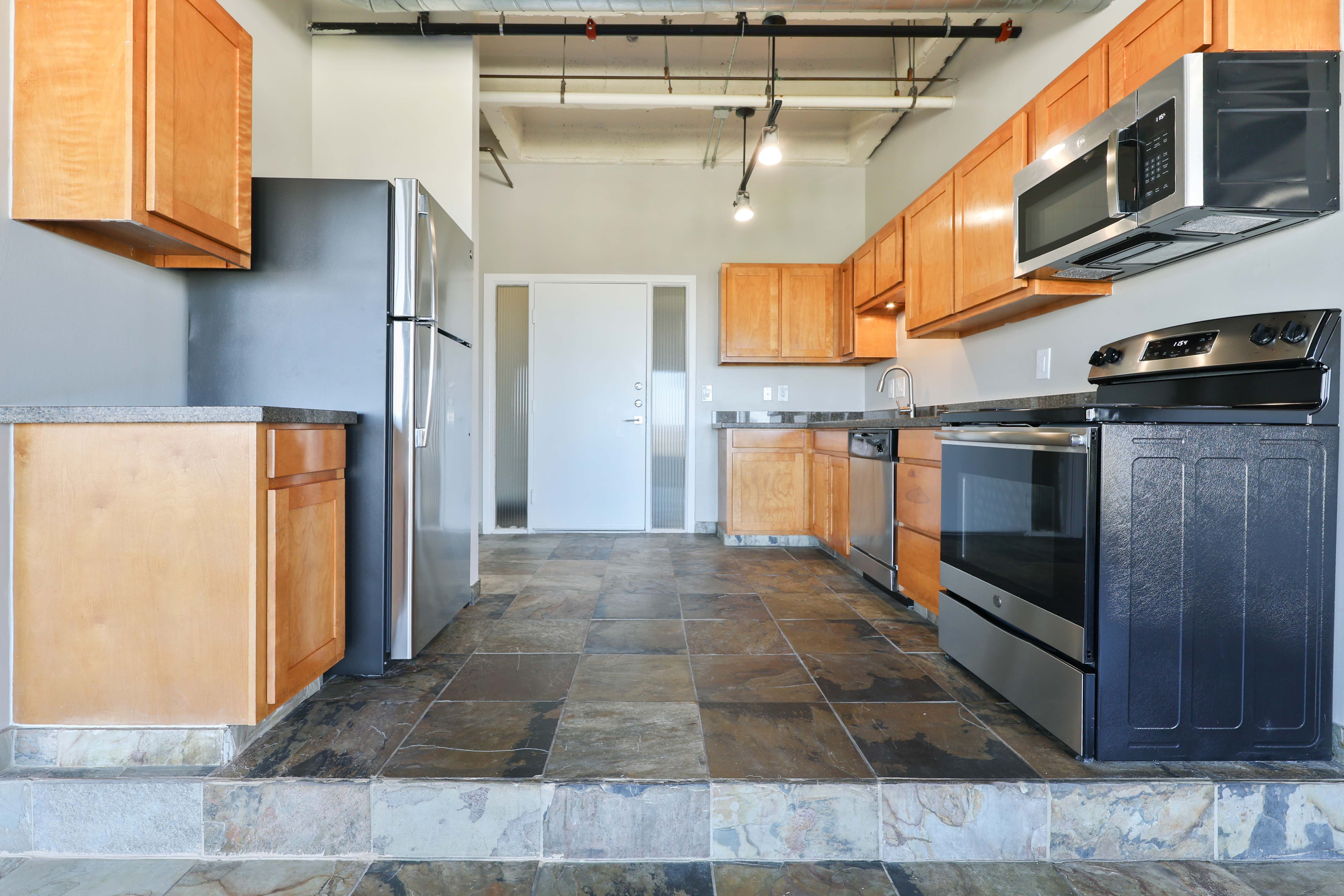 Kitchen with wood cabinets